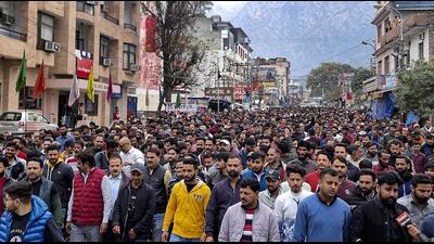 Locals take out a protest march in Katra on Tuesday. (PTI) Locals take out a protest march in Katra on Tuesday. (PTI)