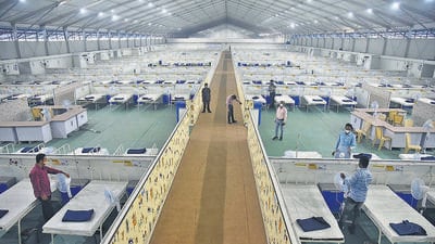 Mumbai, India - December 01, 2021: BMC readies a Dedicated Jumbo Covid-19 Hospital of 21,150-bed capacity amid fears of a third wave due to the new variant Omicron, at Malad, in Mumbai, India, on Wednesday, December 01, 2021. (Photo by Vijay Bate/HT Photo) (HT PHOTO) Mumbai, India - December 01, 2021: BMC readies a Dedicated Jumbo Covid-19 Hospital of 21,150-bed capacity amid fears of a third wave due to the new variant Omicron, at Malad, in Mumbai, India, on Wednesday, December 01, 2021. (Photo by Vijay Bate/HT Photo) (HT PHOTO)
