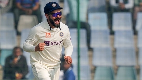 Virat Kohli celebrates after the dismissal of Steven Smith (PTI)