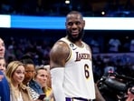 Feb 26, 2023; Dallas, Texas, USA; Los Angeles Lakers forward LeBron James (6) laughs with Kansas City Chiefs quarterback Patrick Mahomes during the fourth quarter against the Dallas Mavericks at American Airlines Center. Mandatory Credit: Kevin Jairaj-USA TODAY Sports