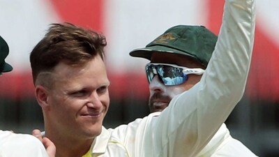 Matthew Kuhnemann shows the ball after grabbing a five-wicket haul on the first day of the 3rd Test match against India (ANI) Matthew Kuhnemann shows the ball after grabbing a five-wicket haul on the first day of the 3rd Test match against India (ANI)