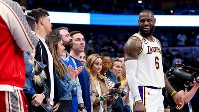 Feb 26, 2023; Dallas, Texas, USA; Los Angeles Lakers forward LeBron James (6) laughs with Kansas City Chiefs quarterback Patrick Mahomes during the fourth quarter against the Dallas Mavericks at American Airlines Center. Mandatory Credit: Kevin Jairaj-USA TODAY Sports (USA TODAY Sports)