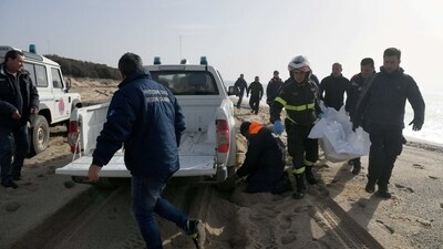 Italian authorities arrested three people and were looking for a fourth suspect who they believe trafficked up to 200 migrants aboard a wooden boat. (AFP) Italian authorities arrested three people and were looking for a fourth suspect who they believe trafficked up to 200 migrants aboard a wooden boat. (AFP)