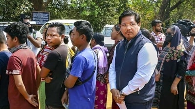 Meghalaya chief minister Conrad Sangma stood in a queue outside a polling booth to cast his vote. (PTI) Meghalaya chief minister Conrad Sangma stood in a queue outside a polling booth to cast his vote. (PTI)