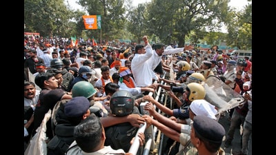 Police personnel stop Bharatiya Janata Party (BJP) Yuva Morcha supporters during a protest against the Odisha government over the killing of former Odisha health minister Naba Kishore Das and the law and order situation in the state (ANI) Police personnel stop Bharatiya Janata Party (BJP) Yuva Morcha supporters during a protest against the Odisha government over the killing of former Odisha health minister Naba Kishore Das and the law and order situation in the state (ANI)