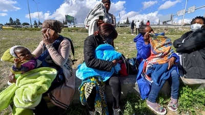 The boat hit rocks and broke up early on Sunday in heavy seas near the town of Steccato di Cutro on the toe of Italy. (AFP) The boat hit rocks and broke up early on Sunday in heavy seas near the town of Steccato di Cutro on the toe of Italy. (AFP)