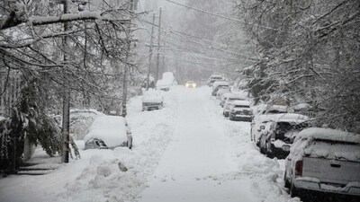 A vehicle attempts to drive along snow-covered Conaway Avenue in downtown Grass Valley, California during a snowstorm. Travel danger in California, Sierra Nevada range, San Bernardino range due to snowstorms (Elias Funez/The Union via AP) A vehicle attempts to drive along snow-covered Conaway Avenue in downtown Grass Valley, California during a snowstorm. Travel danger in California, Sierra Nevada range, San Bernardino range due to snowstorms (Elias Funez/The Union via AP)