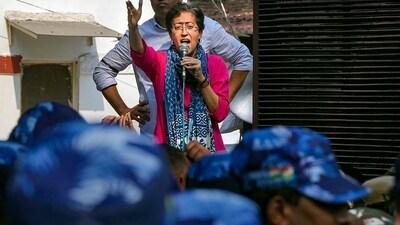 Aam Aadmi Party (AAP) MLA Atishi speaks during a protest against the arrest of Delhi Deputy Chief Minister Manish Sisodia by CBI in the excise policy case, at AAP office in New Delhi, Monday. (PTI) Aam Aadmi Party (AAP) MLA Atishi speaks during a protest against the arrest of Delhi Deputy Chief Minister Manish Sisodia by CBI in the excise policy case, at AAP office in New Delhi, Monday. (PTI)