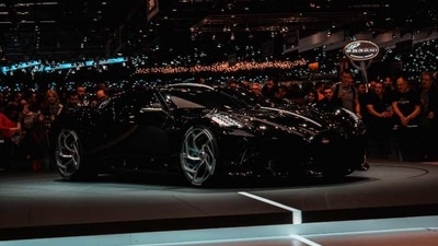 Bugatti La Voiture Noire: This one-of-a-kind Bugatti is the world's most expensive car, with a price tag of $19 million. It is powered by a massive 8.0-liter W16 engine and boasts 1,479 horsepower. The car is made of lightweight carbon fiber and features a unique design that is sure to turn heads. (Unsplash)