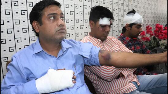 Guests, injured in a brawl at a Ghaziabad hotel a few days ago, address a press conference after lodging an FIR on Tuesday. (Sakib Ali/ HT Photo)