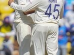 India's Ravichandran Ashwin, left, gets a tap on the shoulder from captain Rohit Sharma India's Ravichandran Ashwin, left, gets a tap on the shoulder from captain Rohit Sharma