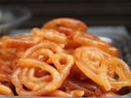 Jalebi is made with a deep-fried batter, soaked in a sugar syrup. Jalebi is made with a deep-fried batter, soaked in a sugar syrup.