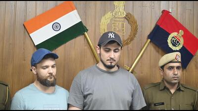 Gurugram, India-March 02, 2023: (C)Priyanshu Dewan, ACP Cyber Crime and Preet Pal, ACP Crime address a press conference after arrested the 13 people including two foreign-origin Konstantin Phillips (citizen of Latvia), Albert Saribekyan aka Peter (citizen of Uzbekistan), who allegedly cheated by fraudulently investing money in the stock market, in Gurugram, India, on Thursday, 02 March 2023. (Photo by Parveen Kumar/Hindustan Times)(Pic to go with Leena Dhankar's story) Gurugram, India-March 02, 2023: (C)Priyanshu Dewan, ACP Cyber Crime and Preet Pal, ACP Crime address a press conference after arrested the 13 people including two foreign-origin Konstantin Phillips (citizen of Latvia), Albert Saribekyan aka Peter (citizen of Uzbekistan), who allegedly cheated by fraudulently investing money in the stock market, in Gurugram, India, on Thursday, 02 March 2023. (Photo by Parveen Kumar/Hindustan Times)(Pic to go with Leena Dhankar's story)