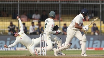 Australia's captain Steve Smith, left, drives to takes a catch to dismiss India's Cheteshwar Pujara, right, during the second day of third cricket test match between India and Australia in Indore, India, Thursday, March 2, 2023. (AP Photo/Surjeet Yadav) (AP) Australia's captain Steve Smith, left, drives to takes a catch to dismiss India's Cheteshwar Pujara, right, during the second day of third cricket test match between India and Australia in Indore, India, Thursday, March 2, 2023. (AP Photo/Surjeet Yadav) (AP)