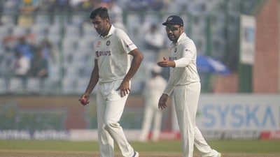 India's captain Rohit Sharma, right, gestures to his teammate Ravichandran Ashwin as he prepares to bowl during the third day of the second cricket test match between India and Australia in New Delhi, India, Sunday, Feb. 19, 2023. (AP Photo/Altaf Qadri) (AP) India's captain Rohit Sharma, right, gestures to his teammate Ravichandran Ashwin as he prepares to bowl during the third day of the second cricket test match between India and Australia in New Delhi, India, Sunday, Feb. 19, 2023. (AP Photo/Altaf Qadri) (AP)