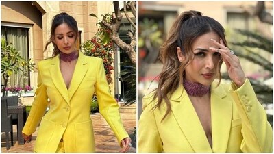 Malaika Arora brings the heat in sleek yellow blazer and pants outfit. (Instagram) Malaika Arora brings the heat in sleek yellow blazer and pants outfit. (Instagram)