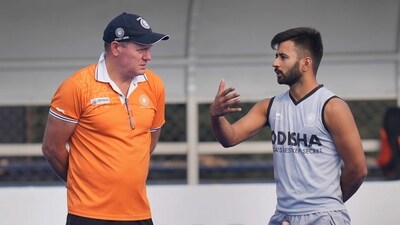 India's Manpreet Singh with Graham Reid during a practice session (PTI) India's Manpreet Singh with Graham Reid during a practice session (PTI)