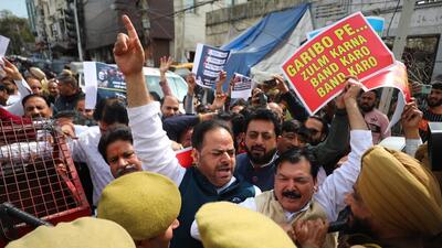 Police stop Congress’ J&K chief Vikar Rasool Wani and other senior party leaders during a protest over the imposition of property tax, in Jammu on Thursday. (PTI) Police stop Congress’ J&K chief Vikar Rasool Wani and other senior party leaders during a protest over the imposition of property tax, in Jammu on Thursday. (PTI)