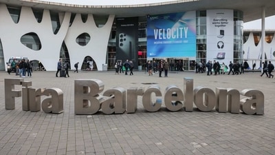 Attendees arrive at the venue on the opening day of the MWC Barcelona at the Fira de Barcelona venue in Barcelona, Spain, on Monday, Feb. 27, 2023. The annual flagship mobile industry and technology event runs from Feb. 27 to March 2. Photographer: Angel Garcia/Bloomberg (Bloomberg) Attendees arrive at the venue on the opening day of the MWC Barcelona at the Fira de Barcelona venue in Barcelona, Spain, on Monday, Feb. 27, 2023. The annual flagship mobile industry and technology event runs from Feb. 27 to March 2. Photographer: Angel Garcia/Bloomberg (Bloomberg)