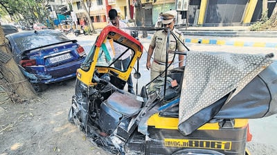 Thane, India - March 02, 2023: Police inspect the mangled remains of an autorickshaw after a car driver rammed into it and ran away killing the auto driver in a hit-and-run case, near Jupiter Hospital, in Thane, India, on Thursday, March 02, 2023. (Praful Gangurde/HT Photo) (HT PHOTO)
