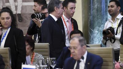 US secretary of state Antony Blinken, (top centre), walks past Russian foreign minister Sergey Lavrov during the G20 foreign ministers' meeting in New Delhi on March 2 (AP) US secretary of state Antony Blinken, (top centre), walks past Russian foreign minister Sergey Lavrov during the G20 foreign ministers' meeting in New Delhi on March 2 (AP)