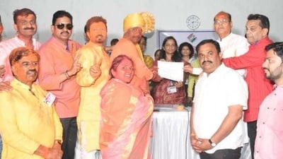Ravindra Dhangekar gets his winner's certificate (ANI) Ravindra Dhangekar gets his winner's certificate (ANI)