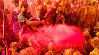 Barsana: This small town in Uttar Pradesh is famous for its Lathmar Holi, where women beat men with sticks (in a playful manner) to commemorate Lord Krishna's playful pastime with the gopis. (Unsplash) Barsana: This small town in Uttar Pradesh is famous for its Lathmar Holi, where women beat men with sticks (in a playful manner) to commemorate Lord Krishna's playful pastime with the gopis. (Unsplash)