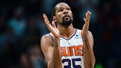 Kevin Durant #35 of the Phoenix Suns reacts in the fourth quarter during their game against the Charlotte Hornets at Spectrum Center. (Getty Images via AFP) Kevin Durant #35 of the Phoenix Suns reacts in the fourth quarter during their game against the Charlotte Hornets at Spectrum Center. (Getty Images via AFP)