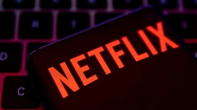 Smartphone with Netflix logo is placed on a keyboard. (REUTERS)