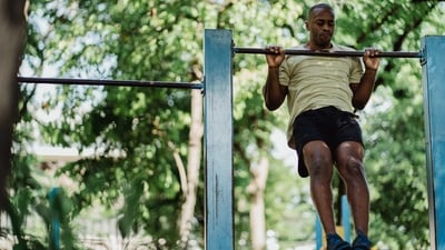 Chin-Ups: Chin-ups are a great exercise for building upper-body strength. Start by gripping a chin-up bar with an overhand grip. Pull yourself up until your chin is above the bar. Slowly lower yourself back to the starting position (Pexels )