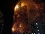 Hong Kong Skyscraper Fire: A building is seen on fire in Hong Kong. 