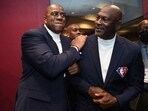 Magic Johnson(left) with Michael Jordan