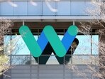 A sign is posted on the exterior of a Waymo office on March 01, 2023 in Mountain View, California. (AFP )