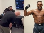 Jon Jones and Bo Nickal engaged in a friendly fight(left); Jon Jones Jon Jones and Bo Nickal engaged in a friendly fight(left); Jon Jones