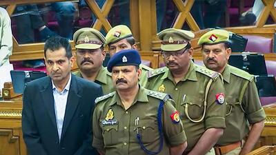 A video grab of a retired IAS officer and five policemen who were sentenced by the Uttar Pradesh assembly on Friday. (PTI PHOTO) A video grab of a retired IAS officer and five policemen who were sentenced by the Uttar Pradesh assembly on Friday. (PTI PHOTO)
