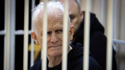 Ales Bialiatski, the head of Belarusian Vyasna rights group, sits in a defendants' cage during a court session in Minsk, Belarus (AP) Ales Bialiatski, the head of Belarusian Vyasna rights group, sits in a defendants' cage during a court session in Minsk, Belarus (AP)