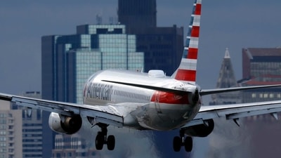 An American Airlines plane lands at Logan International Airport, Thursday, Jan. 26, 2023, in Boston. Communities around the world emitted more carbon dioxide than any other year on record in 2022 as air travel rebounded from the pandemic and cities turned to coal to provide a cheap source of power. (AP Photo/Michael Dwyer) (AP) An American Airlines plane lands at Logan International Airport, Thursday, Jan. 26, 2023, in Boston. Communities around the world emitted more carbon dioxide than any other year on record in 2022 as air travel rebounded from the pandemic and cities turned to coal to provide a cheap source of power. (AP Photo/Michael Dwyer) (AP)