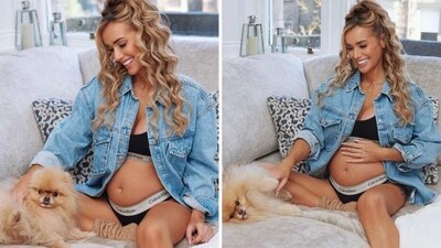 Laura Anderson cradles her baby bump in latest photoshoot. Laura Anderson cradles her baby bump in latest photoshoot.