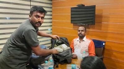 Lokayukta police recovers cash from the house of BJP MLA Madaal Virupakshappa's son Prashanth Kumar (PTI) Lokayukta police recovers cash from the house of BJP MLA Madaal Virupakshappa's son Prashanth Kumar (PTI)