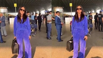 Actor Mrunal Thakur was spotted at the Mumbai airport as she flew out of the city. For her travel, the actor opted for a blue sweatshirt, matching pants, and shoes. She also wore dark sunglasses and carried a black bag. Actor Mrunal Thakur was spotted at the Mumbai airport as she flew out of the city. For her travel, the actor opted for a blue sweatshirt, matching pants, and shoes. She also wore dark sunglasses and carried a black bag.