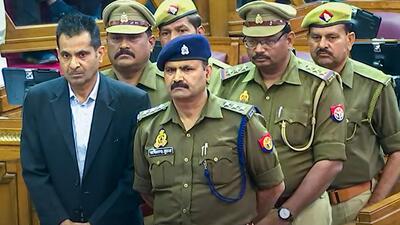 Six policemen in Uttar Pradesh Assembly before they were awarded imprisonment for a day by the House in connection with a breach of privilege notice given by then BJP MLA Salil Vishnoi in an almost two decade old case, in Lucknow on Friday. (PTI) Six policemen in Uttar Pradesh Assembly before they were awarded imprisonment for a day by the House in connection with a breach of privilege notice given by then BJP MLA Salil Vishnoi in an almost two decade old case, in Lucknow on Friday. (PTI)
