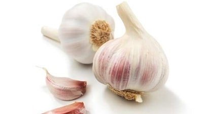 Garlic is known to lower blood pressure, cholesterol and triglycerides. (Unsplash) Garlic is known to lower blood pressure, cholesterol and triglycerides. (Unsplash)