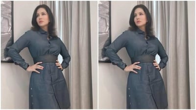 Sunny decked up in the dark blue denim shirt dress featuring collars, full sleeves and a black leather belt at the waist. (Instagram/@sunnyleone) Sunny decked up in the dark blue denim shirt dress featuring collars, full sleeves and a black leather belt at the waist. (Instagram/@sunnyleone)
