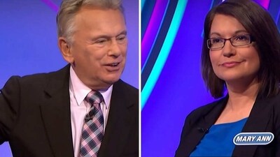 A still of Pat Sajak and Mary Ann from Wheel of Fortune. A still of Pat Sajak and Mary Ann from Wheel of Fortune.