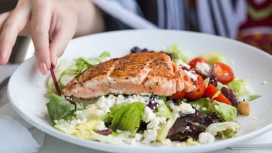 Eating fish two to three times a week helps in reducing high blood pressure as well.&nbsp;(Unsplash)