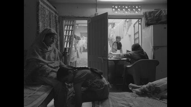 “In their parents’ tiny place, there isn’t any camera movement as it represents their helpless condition, and the lack of tripoded stillness is a metaphor for their precarious and shaky situation” - Shahrukhkhan Chavada (Still from Kayo Kayo Colour) “In their parents’ tiny place, there isn’t any camera movement as it represents their helpless condition, and the lack of tripoded stillness is a metaphor for their precarious and shaky situation” - Shahrukhkhan Chavada (Still from Kayo Kayo Colour)