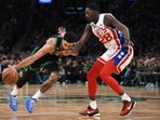 Brooklyn Nets forward Dorian Finney-Smith (28) defends Boston Celtics forward Jayson Tatum (0) during the first half at TD Garden.
