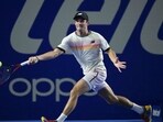 USA's Tommy Paul returns the ball against USA's Taylor Fritz during semifinals the Mexico ATP Open 500 men's singles tennis match at the Arena GNP, in Acapulco, Mexico, on March 3, 2023. (Photo by RODRIGO ARANGUA / AFP)