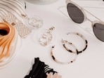 Are you looking to add a touch of glamour to your outfit? Accessories can be the perfect way to elevate your look and make a statement. Whether you're dressing up for a special occasion or just want to add a little something extra to your everyday style, the right accessories can make all the difference. From statement jewellery to wide-brimmed hats, here are ten accessories that can instantly add glamour to any outfit.