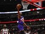 Kevin Durant #35 of the Phoenix Suns goes to the basket and shoots in the second half against the Chicago Bulls at United Center. Kevin Durant #35 of the Phoenix Suns goes to the basket and shoots in the second half against the Chicago Bulls at United Center.